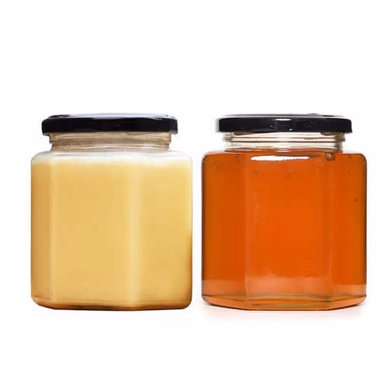 El hexágono vacío al por mayor 730ml 500ml 250ml 200ml atasca el tarro de cristal de la miel de la especia con la tapa del metal